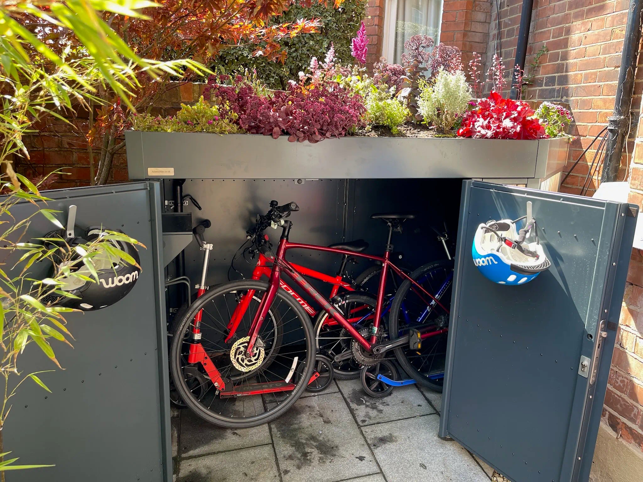 Open bespoke Verde Forma bike store showing secure storage for bicycles, cycling gear, and outdoor equipment.