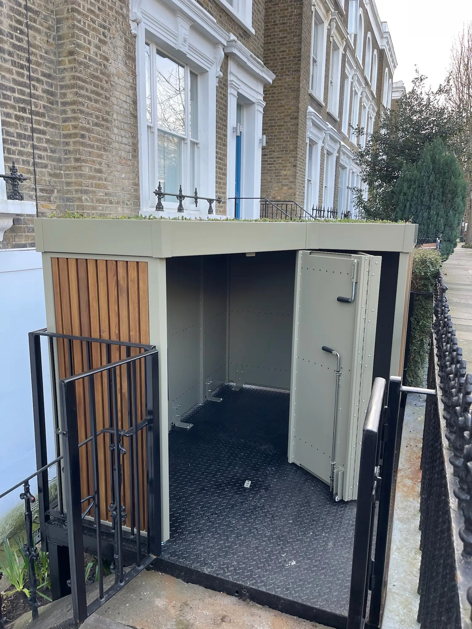 Open view of the Verde cargo bike shed showcasing internal space and timber build