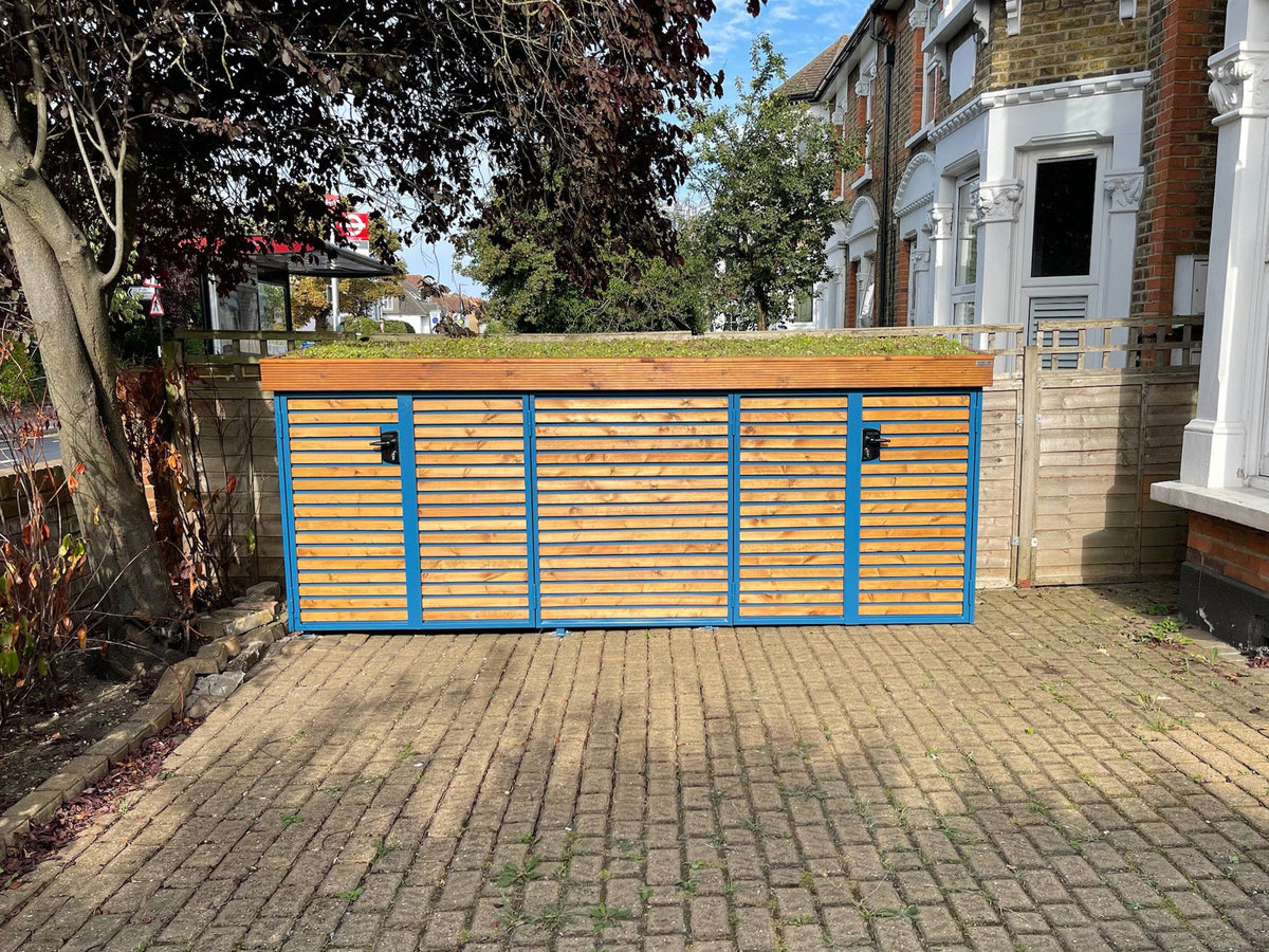 Verde Line storage single compartment unit accommodating up to six bikes, featuring a green roof for London front garden installations.