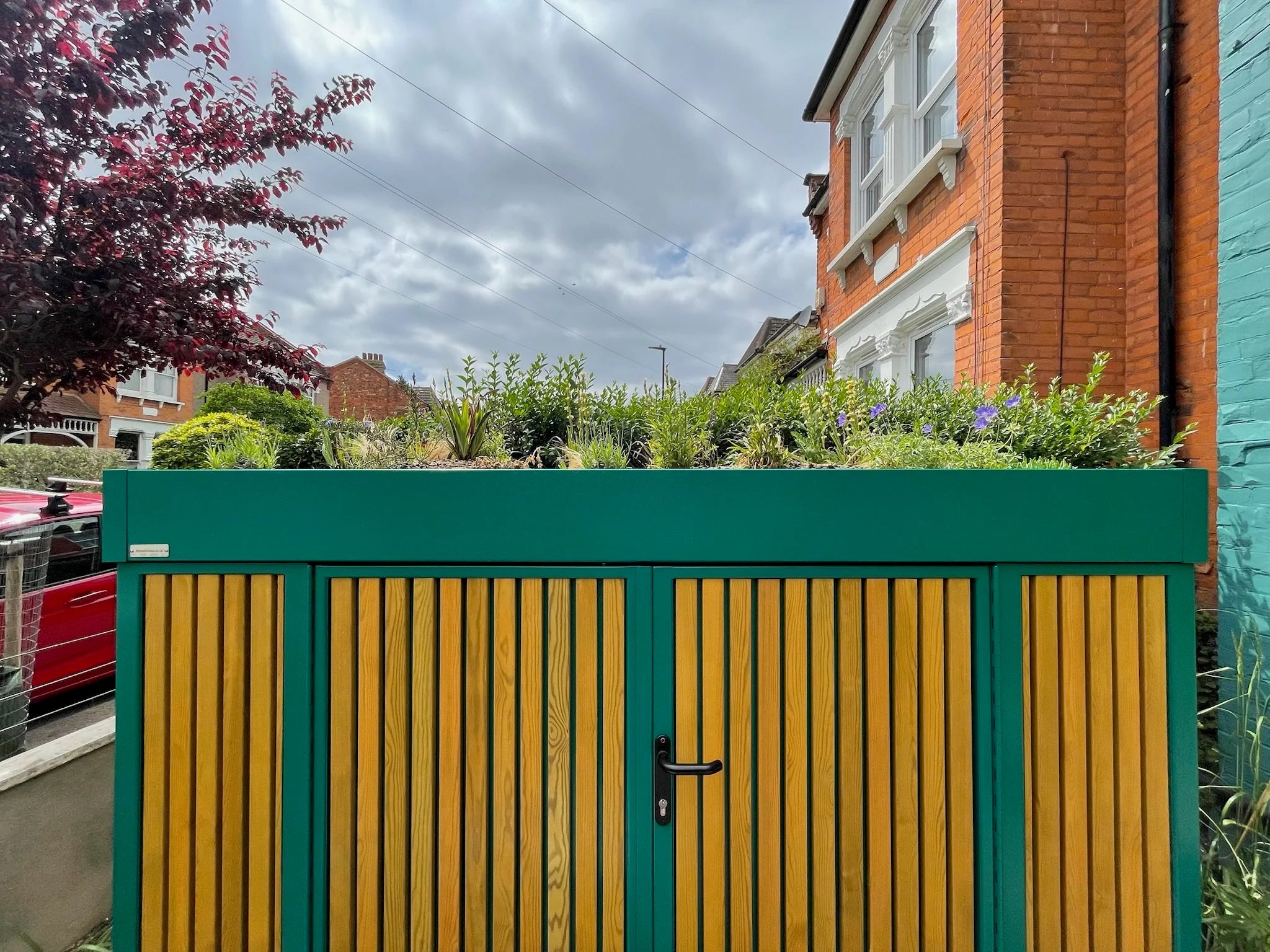 A Front Garden by Butler & Parker and Acacia Gardens, Completed with Integrated Bike Storage by Atlanticbike