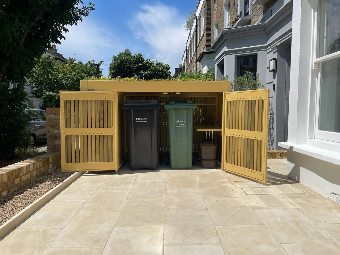 Demonstration of opening and closing the secure bin compartment of Atlanticbike’s green roof outdoor storage unit in a London front garden.