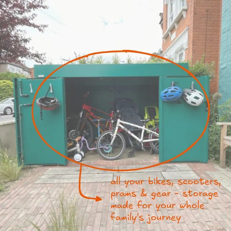 Turquoise blue standalone bike and bin store with green roof, designed for room to grow and storage that adapts as a family and bike collection expand