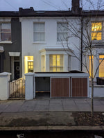 Verde Muro front garden wall replacement featuring integrated bike and bin storage with a green roof, enhancing London home's kerb appeal.​